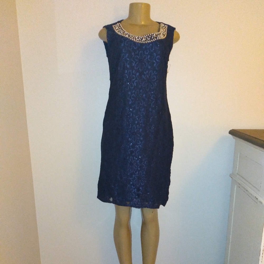 R&M Collection. New navy blue laced lined dress with tiny sparkles. Size: 8